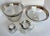 Here is a fabulously chic set of 5 pieces from the 1950's designed by Dorothy Thorpe. The set features two larger bowls...