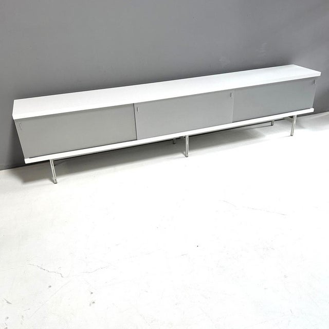 Sideboard model 1730 by Horst Brüning for Behr Production KG, Wendlingen. Sliding doors and base frame made of aluminum....