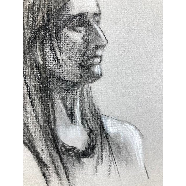 Expressive charcoal portrait on 12" x 18" grey 80 lb. charcoal/pastel paper. Subtle tones of black and grey. Would look...