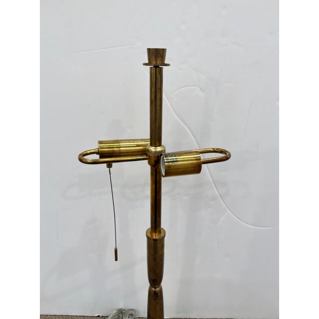 Barbara Barry Aged Brass Lamp. Two lights, one pull chain, round base. Showroom floor sample.
