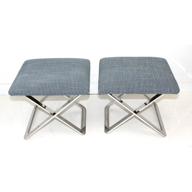 Super-chic pair of Mid-Century Modern X-Stools in polished stainless steel attributed to Milo Baughman. Newly re-upholstered