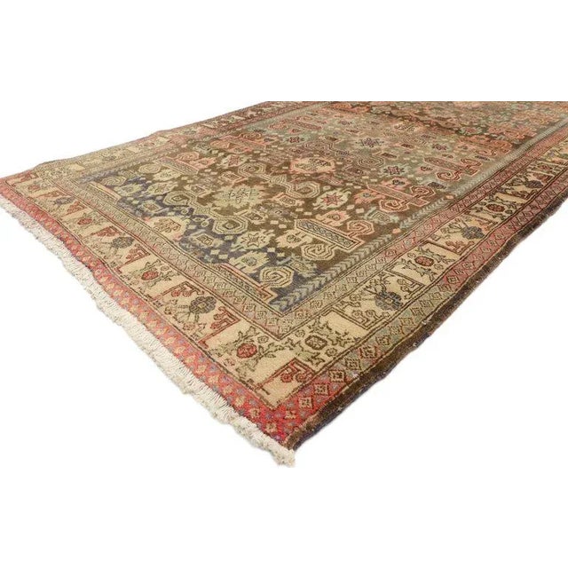 rich symbolism woven in pastel hues create uniquely feminine tribal vibe in this vintage Persian Azerbaijan runner. Ram's...