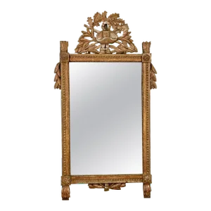 French 1790s Louis XVI Giltwood Wall Mirror with Carved Gardening Crest