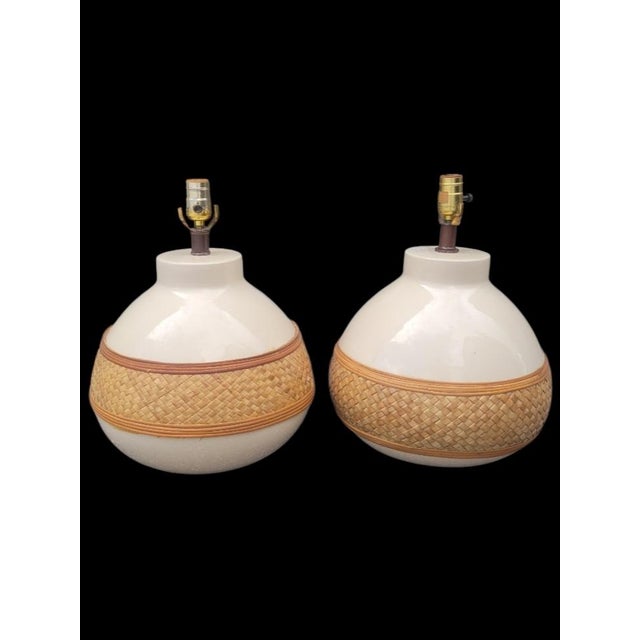Bring warm organic texture and effortless style to your space with this striking pair of vintage ceramic table lamps....