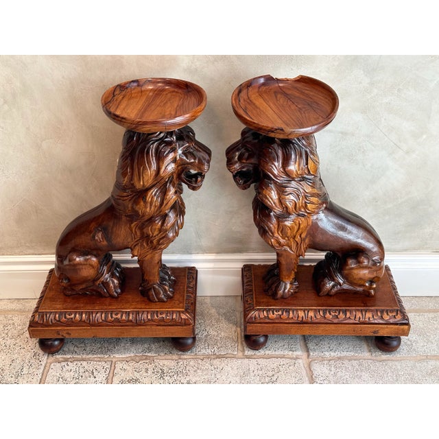 Vintage Pair of Solid Wood Hand-Carved Exotic Lion Plant Stands This stunning pair of vintage solid wood lion plant stands...