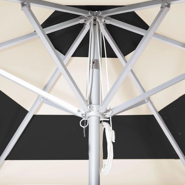 The Beach Club Classic Market Umbrella is a 9' Hexagon in Premium Natural Teak. The canopy features a block stripe in...