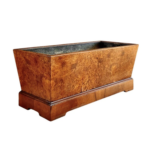 An Edwardian period floor planter in the Georgian style, of unusual form and beautifully crafted of walnut. A well...