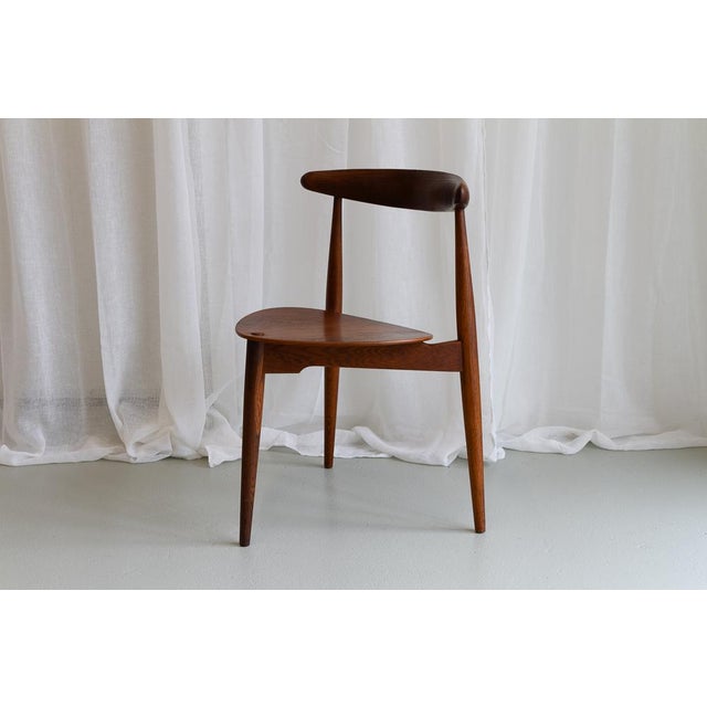 Iconic Danish Mid-Century Modern design by world famous Danish architect Hans Jørgensen Wegner. Manufactured by Fritz...
