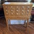 Vintage 15-drawer library card catalog cabinet with a tapered leg stand, typical of mid-century library furniture. No...