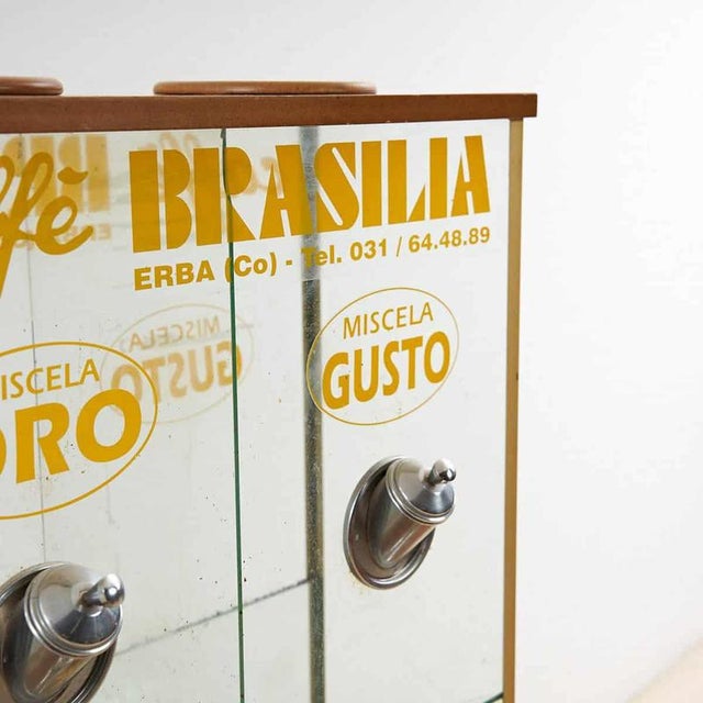 Item : This charming 1960s coffee dispenser is a perfect example of retro design. Crafted with a clear glass body and...