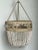 The "Frankie Malibu" chandelier by Ro-Sham-Beaux is a masterclass in coastal elegance and artisanal craftsmanship. This...