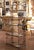 Elegant and airy in profile, this antique French étagère combines graceful scrollwork with the practical versatility of...