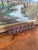 This set of two antique hand-carved wood molding samples features repeating botanical motifs and was likely used as...