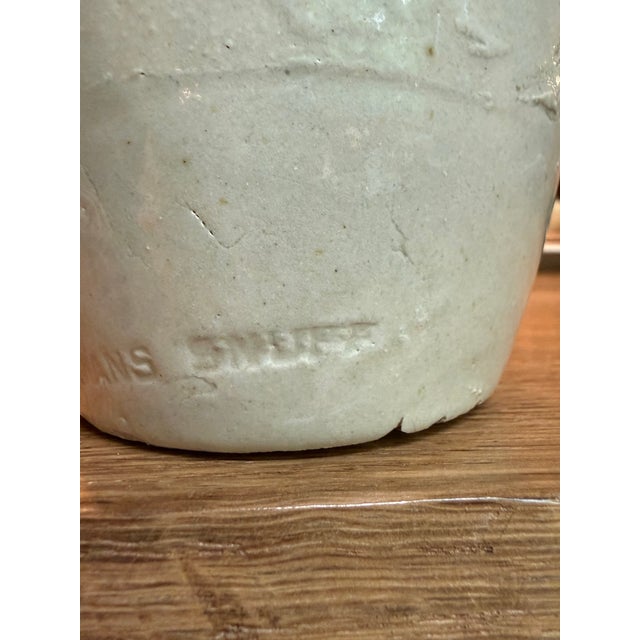 Bring a genuine piece of 19th-century American history into your home. This antique utilitarian stoneware jar was produced...