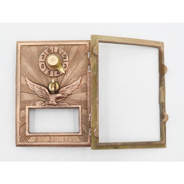 Vintage U.S. Post Office PO Box door, a popular collectible often dating from the early to mid 20th century. It is made of...