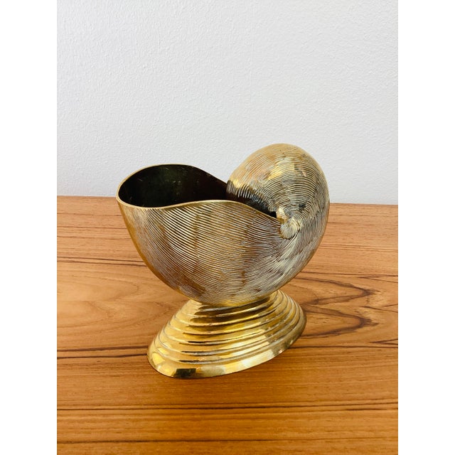 Vintage 1980s Mottahedeh Brass Nautilus Shell Vessel made of brass incised design nautilus on a half shell base by...