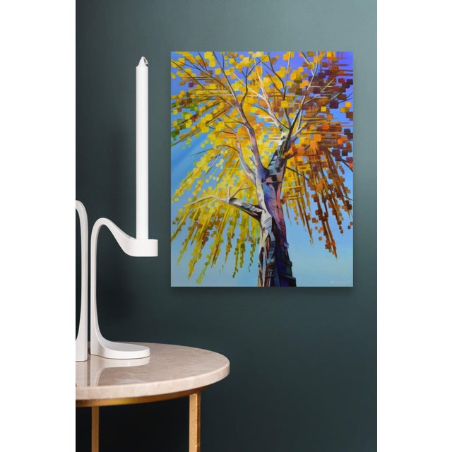 This artwork depicts a vibrant tree in full autumn splendor, its branches adorned with a mosaic of golden leaves against a...