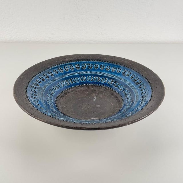 A striking and uncommon centerpiece bowl designed by Aldo Londi for Bitossi in the 1970s, showcasing the iconic Rimini...