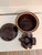 Vintage Mar-Crest Daisy Dot covered stoneware bean pot or casserole in rich Colorado Brown glaze, raised on an unusual...