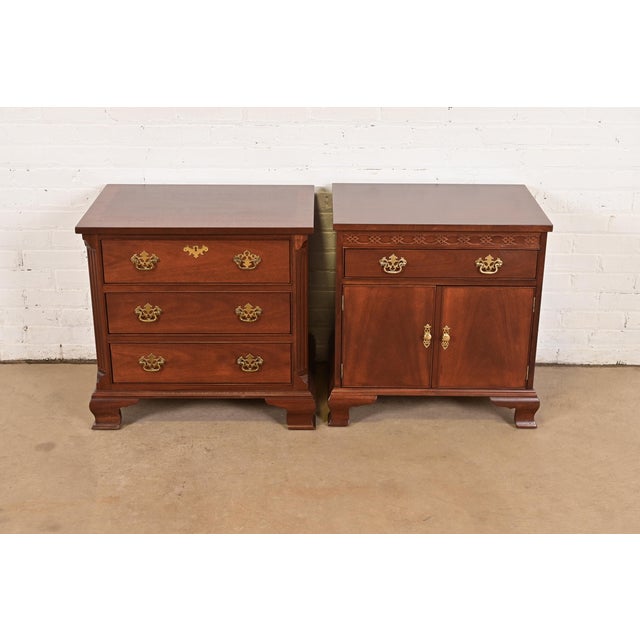 A beautiful pair of Georgian or Chippendale style nightstands or end tables By Baker Furniture USA, Circa 1980s Gorgeous...