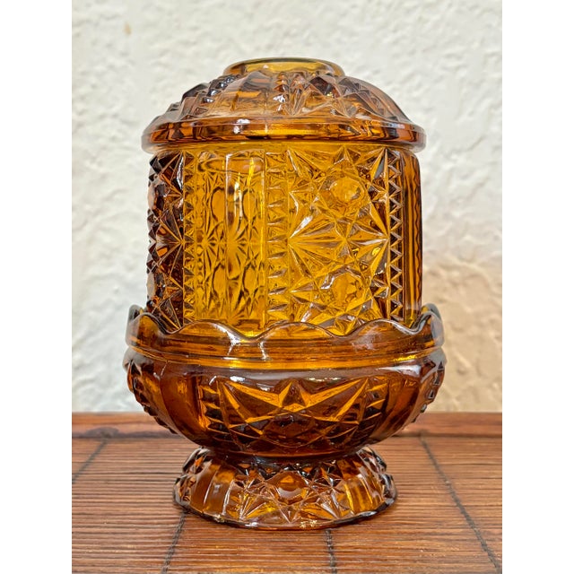 Amber 1960s Indiana Glass fairy lamp. Adds glowing ambiance to an outdoor party or relaxing on the porch. Most items found...