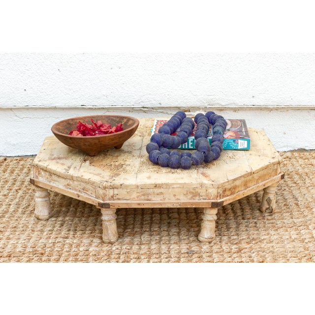 This antique bajot, handcrafted from teak with a bleached finish, offers a glimpse into the rich cultural heritage of...