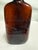 This antique amber glass bottle from J.C.S. Magnus & Co. of Cincinnati, USA, is a unique collectible piece. It is a 1/2...