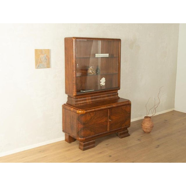 1920s Art Deco Display Cabinet Width: 120 cm Height: 178 cm Depth: 55 cm This piece has been carefully refurbished and is...
