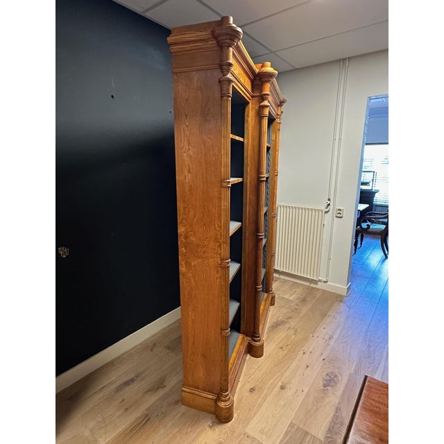Impressive antique Victorian open bookcase. The middle section is deeper, also known as a breakfront. The cabinet is made...