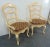 A pair of Country French Arm Chairs , ladderback design with cabriole legs , rush seats with loose fitted cushion, cream...