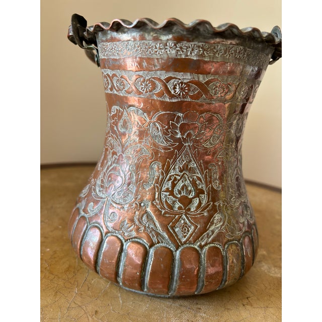 This bucket is a beautiful example of the most refined Persian artistry. It is part of a collection of Persian artifacts...