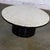 Fantastic vintage Brutalist Heirloom coffee table by Weiman composed of a carved and blackened cylindrical pedestal base...