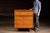 Mid-century modern tall dresser produced under the Harmony House brand for Sears, Roebuck and Co. The warm walnut-toned...