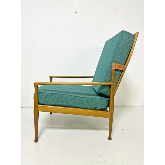 A Danish modern reclining lounge chair and ottoman, ca. 1960s, both stamped Made in Denmark. A unqiue feature of this...