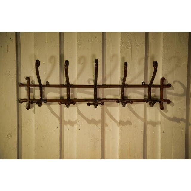 Michael Thonet (1796–1871) was the renowned Austro-Hungarian cabinetmaker who pioneered bentwood furniture, notably the...