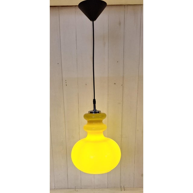 Vintage Ceiling Lamp with Yellow Glass Shade on Chrome-Plated Metal Mount, 1970s, in Very Good conditions. Designed 1970...