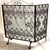 Black Wrought Iron 3 Panel Fireplace Screen With Scroll Work and Leaves. Stands 39 inches tall fully opened 56 inches wide...