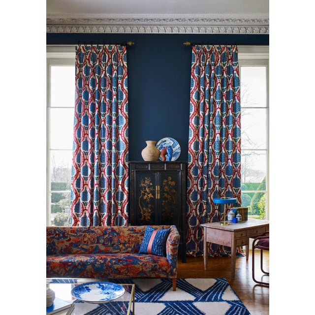 A fabulous large scale embroidery of stylised pomegranate seeds surrounded by a decorative trellis this striking dual...