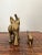Adorable vintage trunks up baby and parent brass elephants from the Mid-Century. In Feng Shui, elephants symbolize...