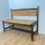 Provençal bench with backrest and integrated storage, 1960 Wooden bench with straw seat Integrated storage under the seat,...