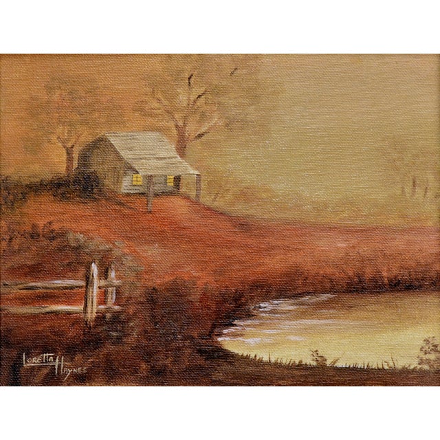 Charming autumnal country cabin at sunrise landscape by Loretta Haynes (American, 1930 - 2017), c.1980s. A small, rustic...