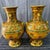 Make a grand statement with this spectacular pair of monumental cloisonné enamel vases. A true tour de force of...