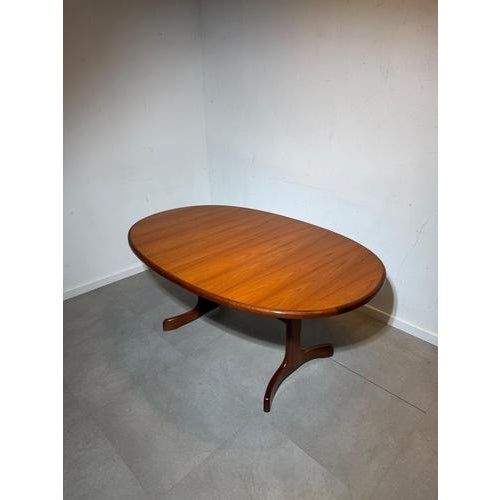 A stunning and iconic g-plan extendable dining table, often referred to as the “whale tail” table due to its sculptural...