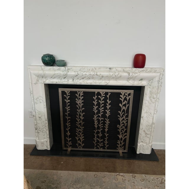 The Penelope Fire Screen is a refined expression of organic modern design, blending natural motifs with a clean,...