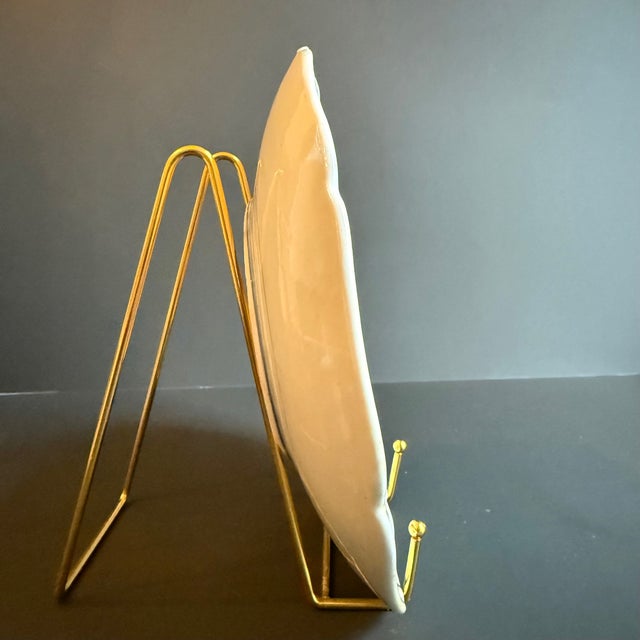 Beautiful Vintage Imari style decorative plate featuring navy, sapphire blue, leaf green, and a coppery orange on a white...