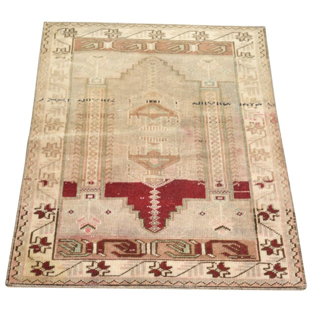 Hand-knotted with care using traditional rug-making techniques, this wool rug blends timeless craftsmanship with a modern...