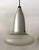 Here is a pair of sculptural Space Age pendant lights dating to the 1960s. Each features an elongated brushed aluminum...
