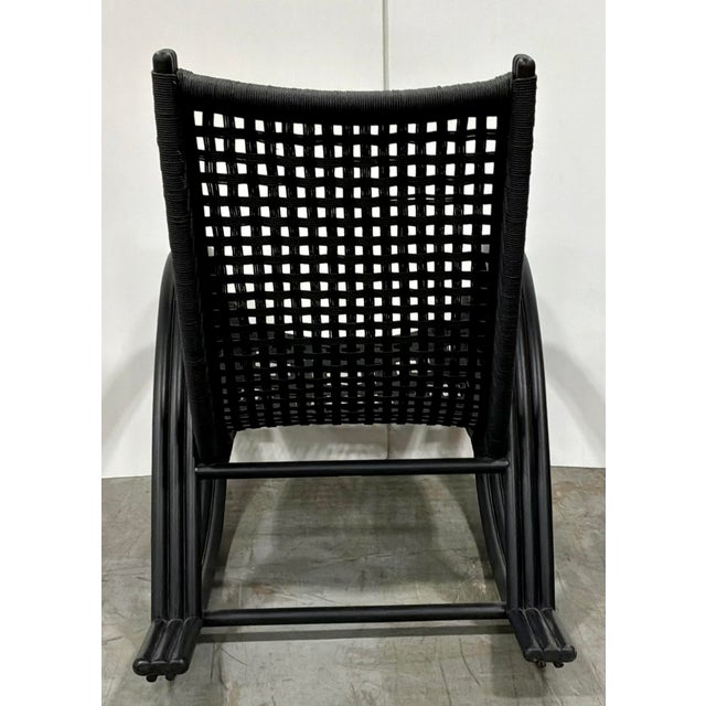 Original retail $2247, stylish Baker Modern Nero Finish Rattan and Woven Rawhide Rollick Rollick Rocking Chair, showroom...