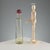 Blown glass bottle with red cap. Designer's signature and manufacturer's sticker. Bottle height 29.5 cm. Original box....