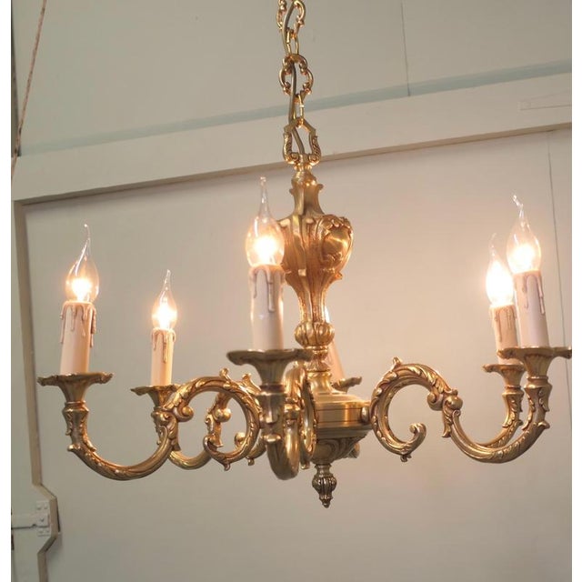 Large French Rococo Gilded Brass 6 Light Chandelier This is a very good quality and heavy piece, it has 6 arms and hangs...